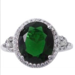 Beautiful emerald and white diamond ring